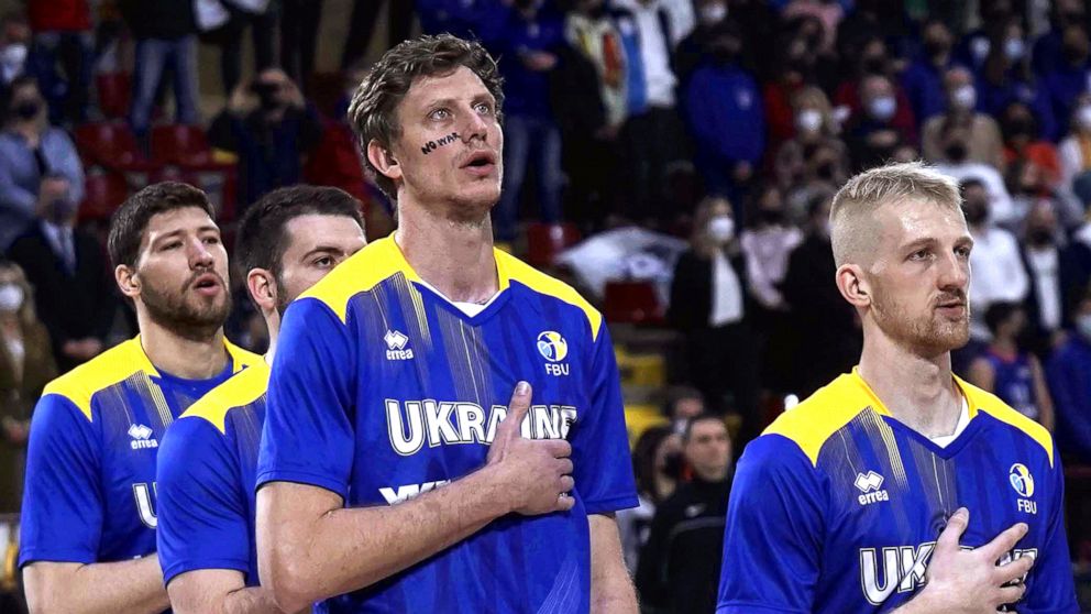 PHOTO: Ukraine's players listen to their national anthem ahead of the FIBA Basketball World Cup 2023 qualifying game between Spain and Ukraine at Vista Alegre Pavilion in Cordoba, Andalusia, Spain, Feb. 24, 2022.