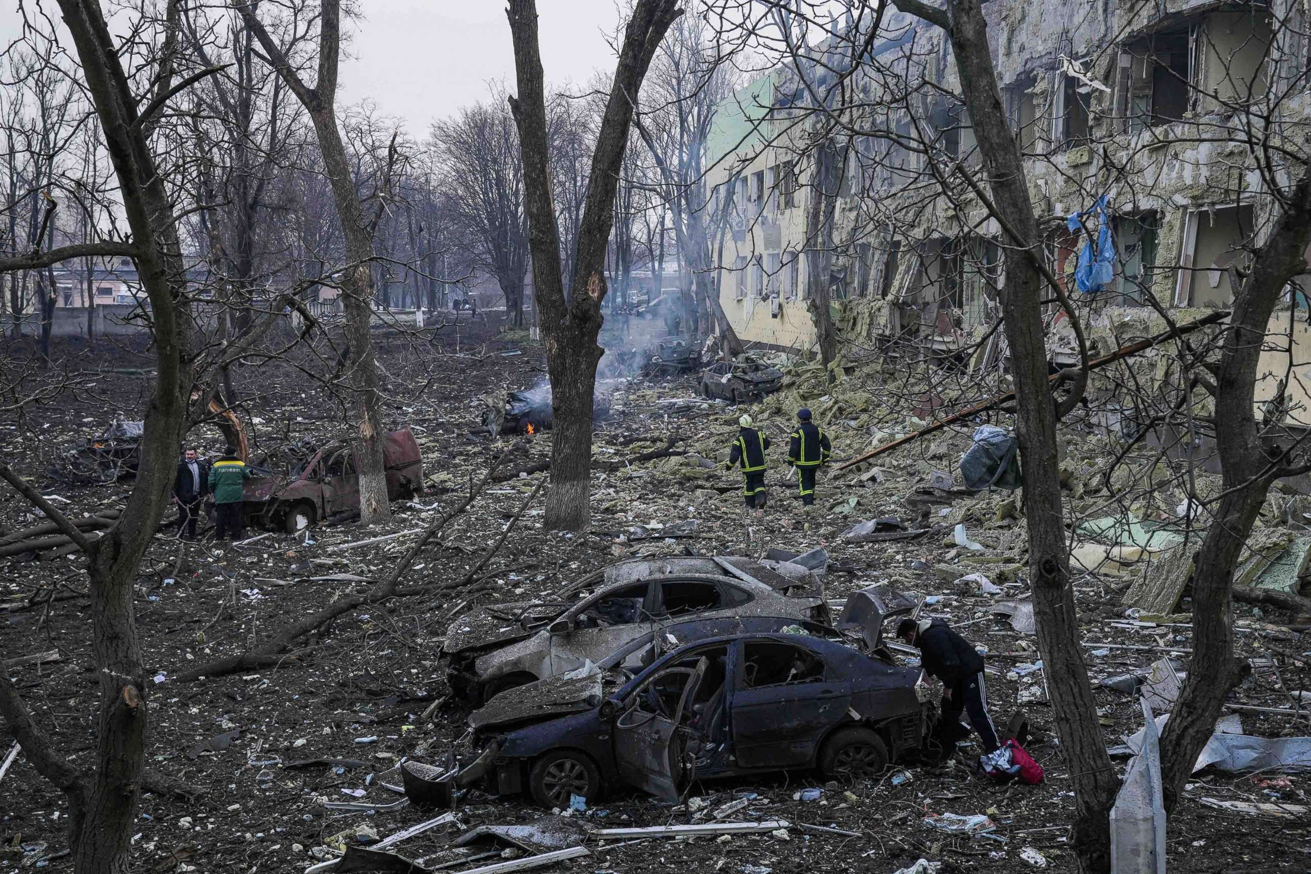 PHOTO: Ukrainian emergency employees work at the site of a maternity hospital damaged by shelling in Mariupol, Ukraine, on March 9, 2022.