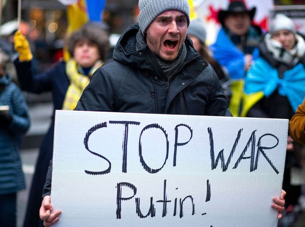 PHOTO: Demonstrators protest in support of Ukraine, in Times Square in New York, on Feb. 24, 2022.