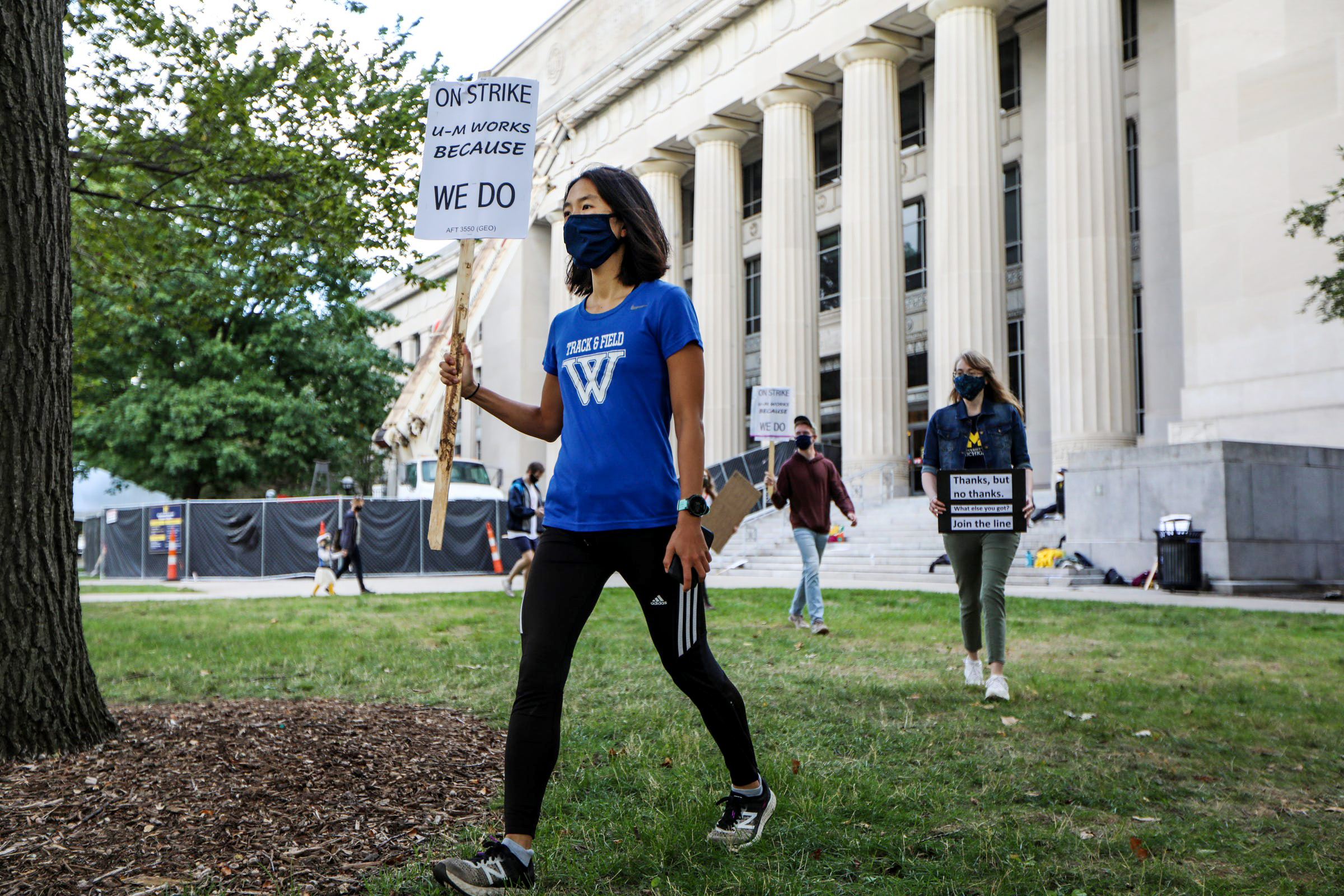 PHOTO: Members of the Graduate Employees' Organization Local 3550 protest outside of Angell Hall on the University of Michigan campus in Ann Arbor, Mich., Sept. 11, 2020.