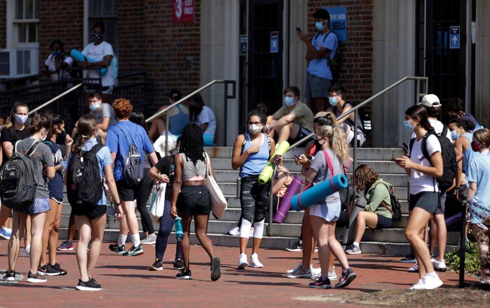 PHOTO: Students wait to enter Woolen Gym on the University of North Carolina at Chapel Hill campus in Chapel Hill, North Carolina, on Aug. 17, 2020.