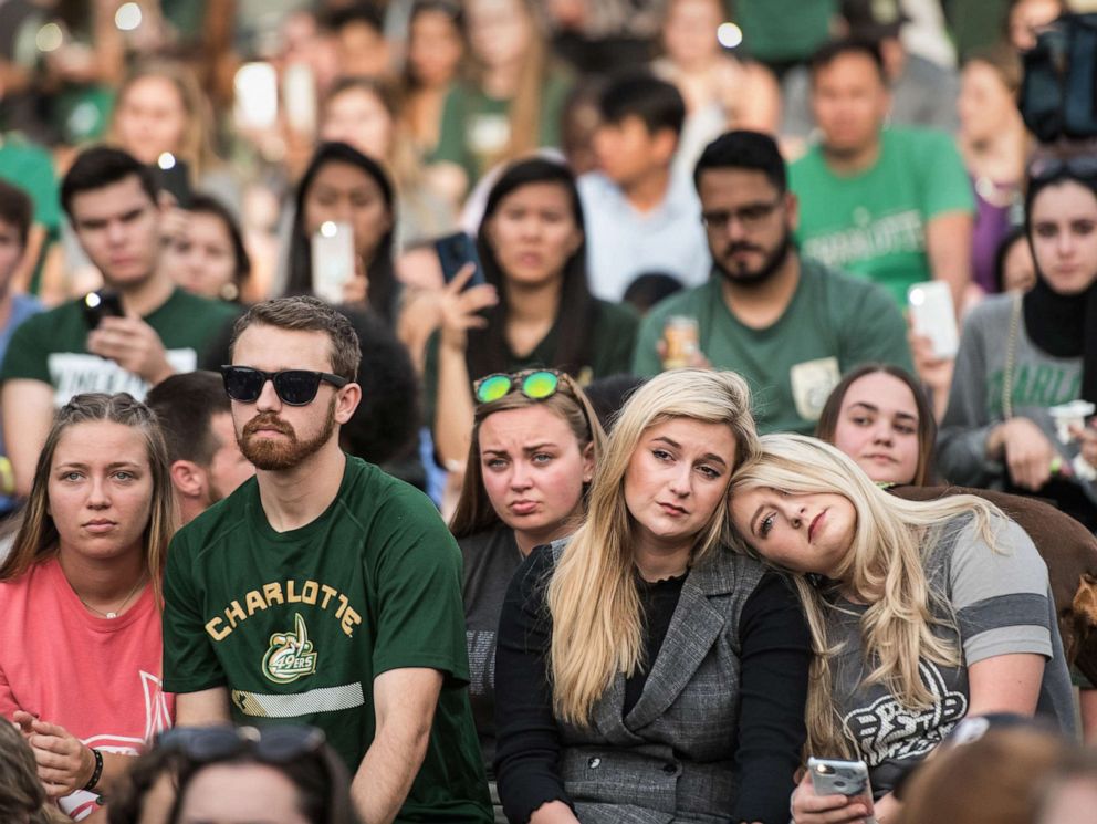 PHOTO: UNC Charlotte students participate in a vigil on campus where the previous day a gunman killed two people and injured four students on May 1, 2019 in Charlotte, N.C.