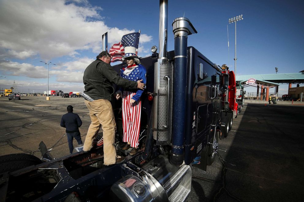 PHOTO: Truckers gather in California before a convoy leaves bound for the nation's capital to protest against COVID-19 vaccine mandates, Feb. 22, 2022.
