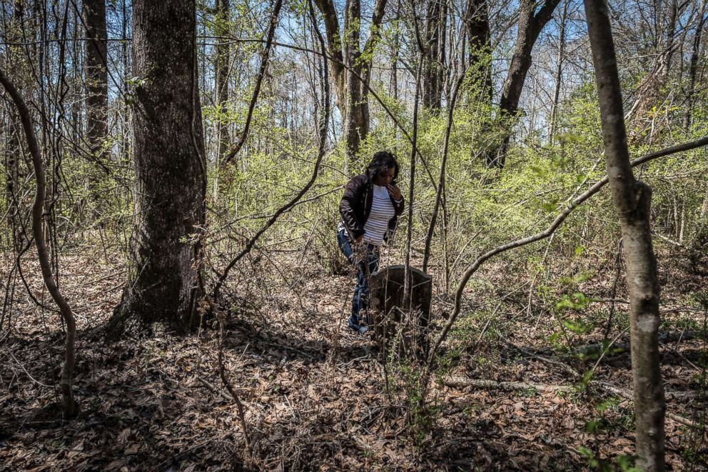 PHOTO: Karin Berry visits Norwood Cemetery in Louisiana where many graves have no identification or have deteriorated so much that it is difficult to know who is buried where.