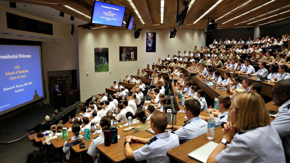 PHOTO: More than 150 medical students from the Uniformed Services University's F. Edward Hebert School of Medicine class of 2020 will be graduating early to join the ranks of the military health system. 