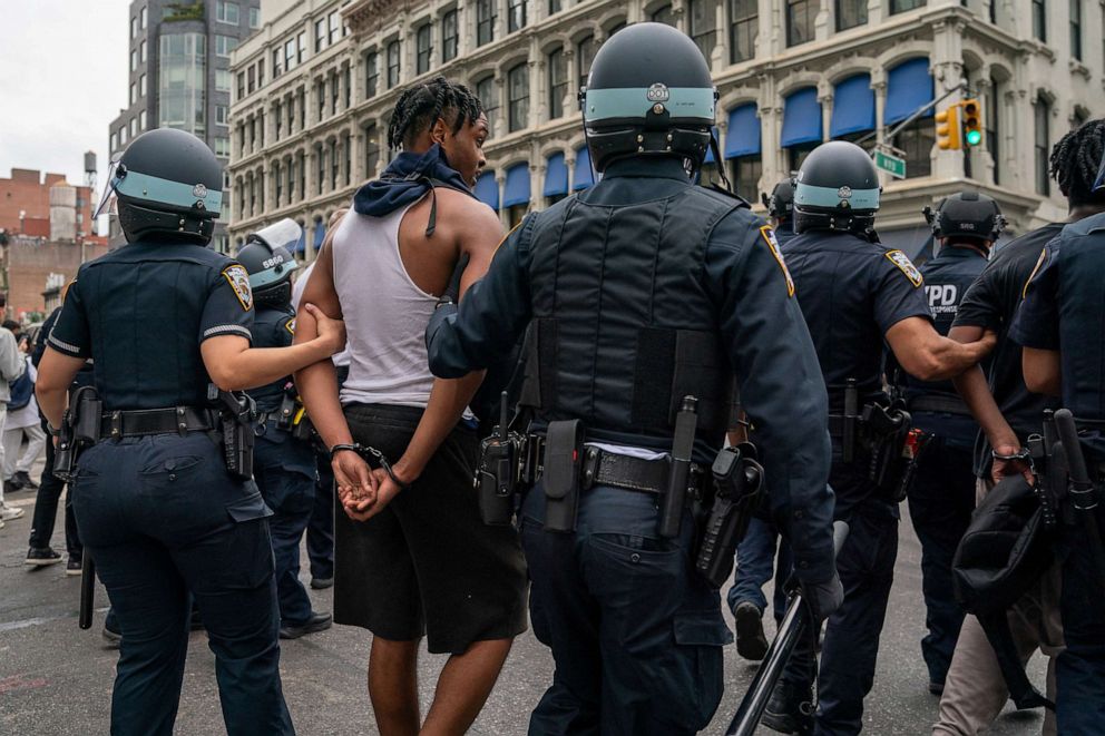 PHOTO: Police officers detain a person after popular live streamer Kai Cenat announced a "giveaway" event at Union Square in New York City, Aug. 4, 2023.