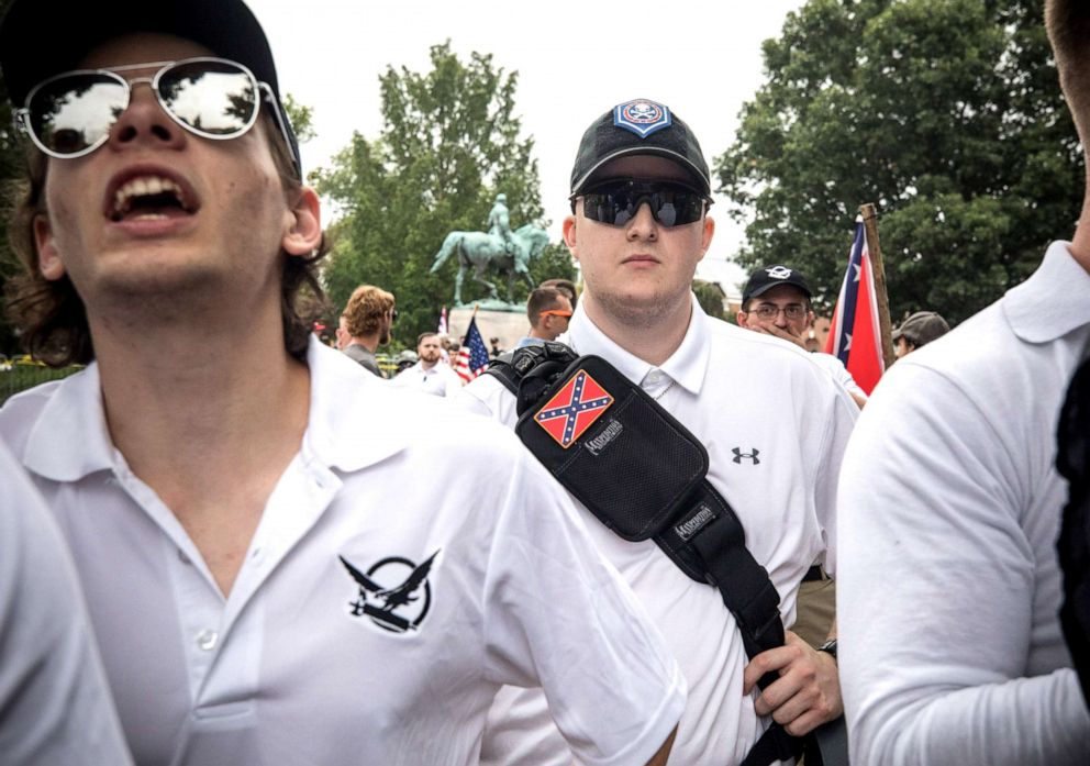 PHOTO: White supremacist groups rally in Emancipation Park during the Unite the Right Rally, Aug. 12, 2017.