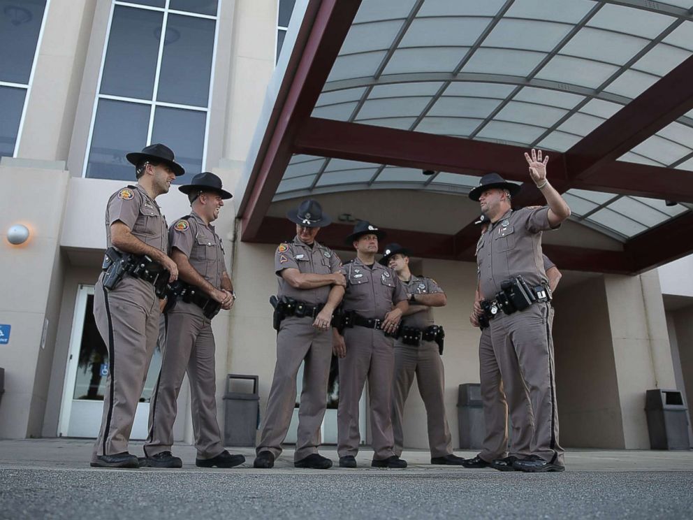 PHOTO: Florida Highway Patrol officers stand outside the Curtis M. Phillips Center for the Performing Arts as they prepare the venue for Thursdays scheduled speech by white nationalist Richard Spencer on Oct. 18, 2017 in Gainesville, Fla.