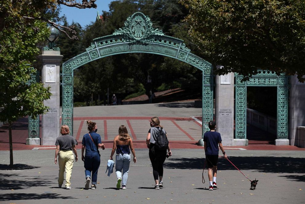 PHOTO: People walk towards Sather Gate on the U.C. Berkeley campus on July 22, 2020, in Berkeley, Calif.