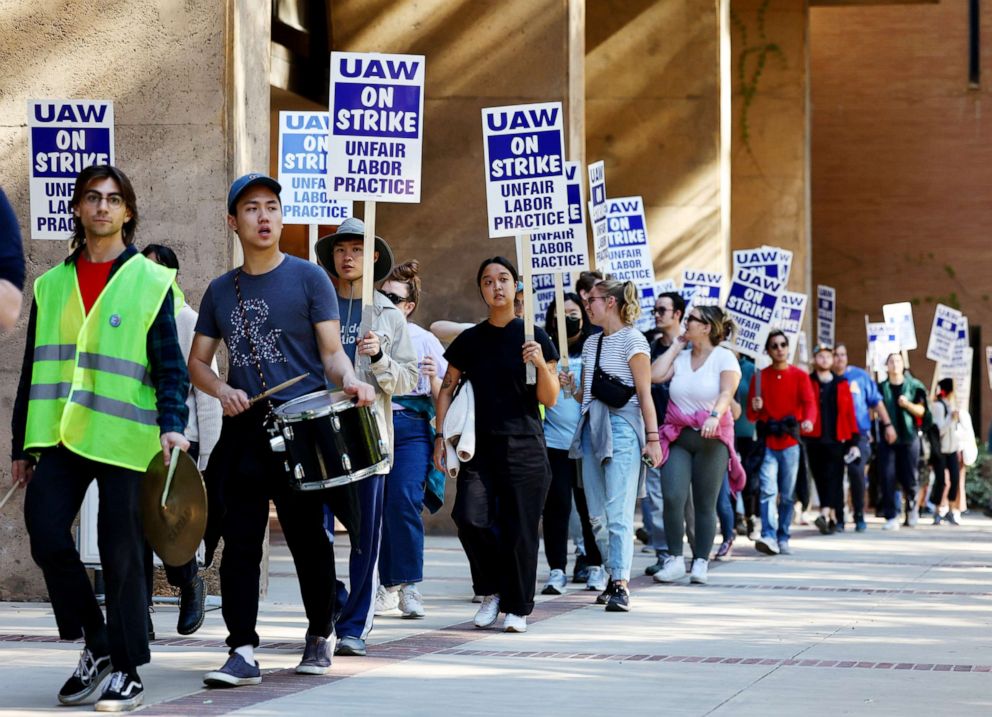 PHOTO: In this Nov. 15, 2022, file photo, academics and union supporters march and demonstrate on the UCLA campus in Los Angeles amid a statewide strike of nearly 48 000 unionized workers from the University of California.