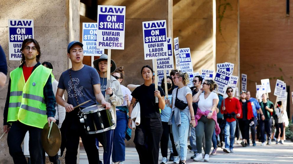 PHOTO: Academics and union supporters march and demonstrate on the UCLA campus amid a statewide strike by nearly 48,000 unionized University of California workers on November 15, 2022 in Los Angeles.