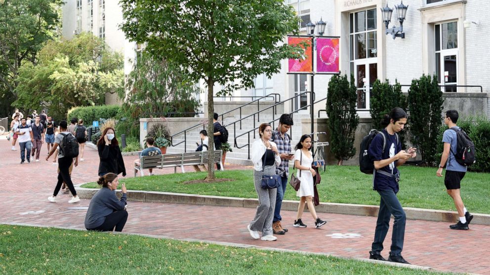 PHOTO: Students walk in Northeastern University campus on Sept. 14, 2022, in Boston.