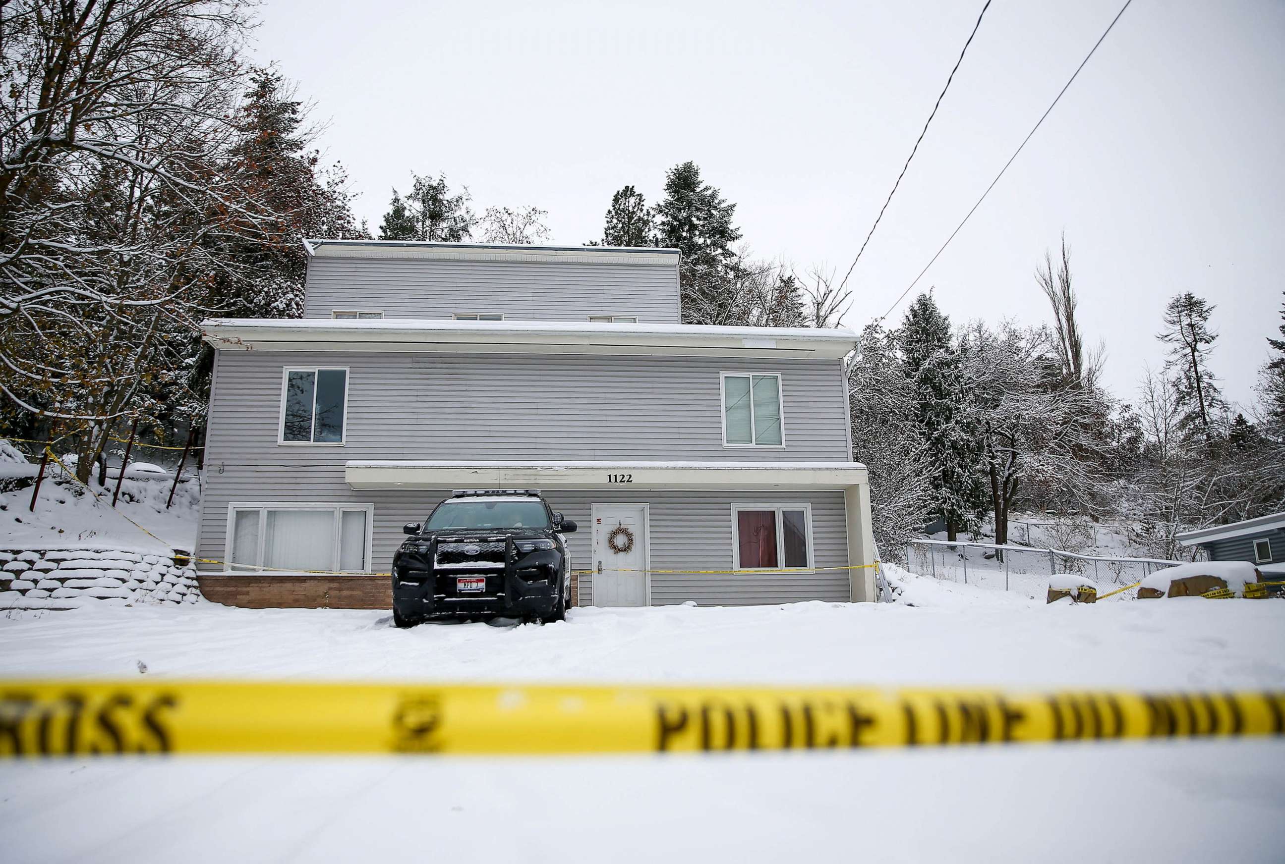 PHOTO: Moscow Police monitor the residence where four University of Idaho students were killed in Moscow, Idaho, Nov. 30, 2022.