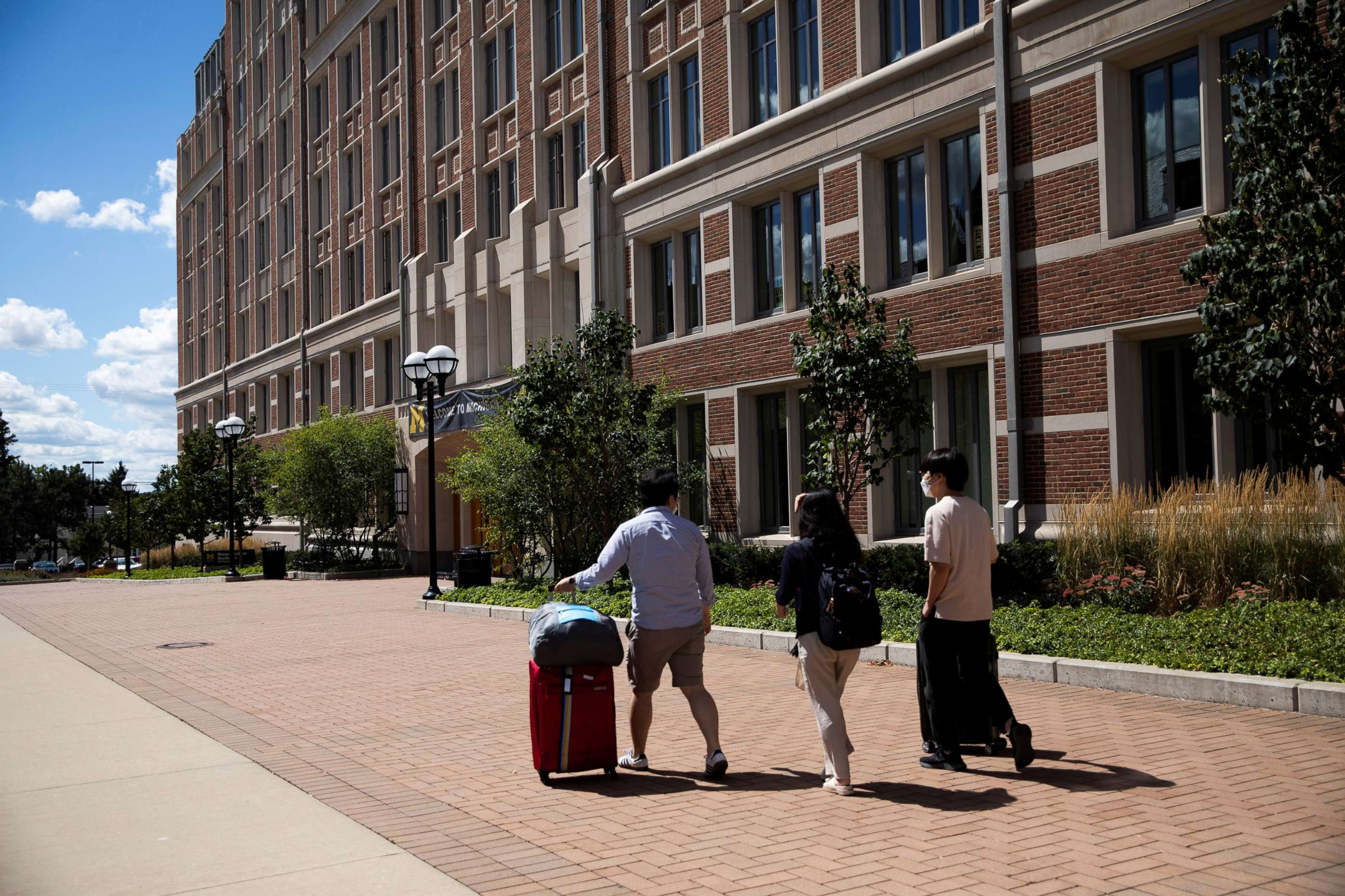 PHOTO: In this Aug. 19, 2020, file photo, students move back into the dorm for fall semester at the University of Michigan campus, amid the COVID-19 outbreak, in Ann Arbor, Mich.