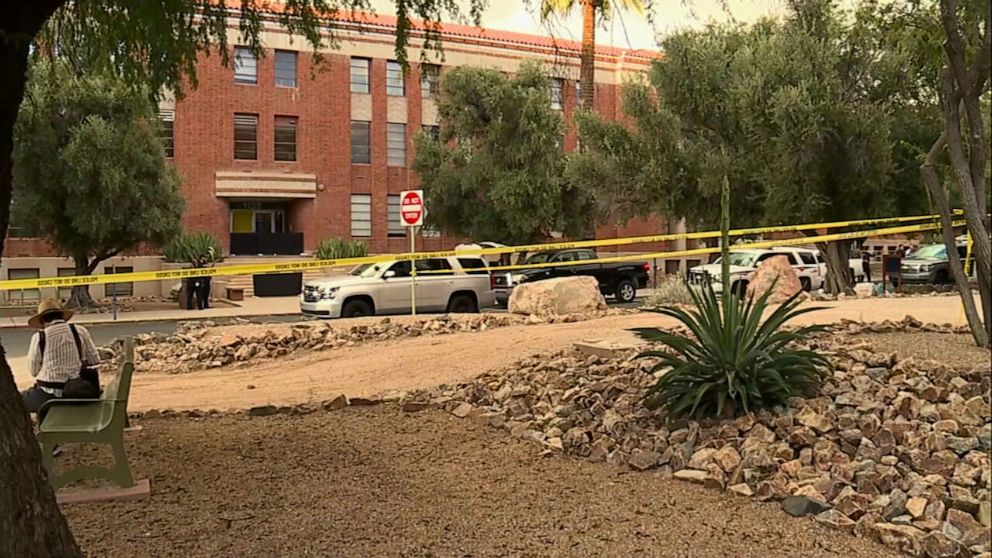 PHOTO: In this screen grab from a video, police tape crosses the scene where a person was killed on the University of Arizona campus in Tucson, Ariz.