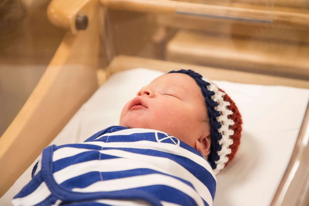 PHOTO: A nurse from UPMC, a Pittsburgh hospital, knit Team USA caps for newborns to wear to celebrate the Olympics.