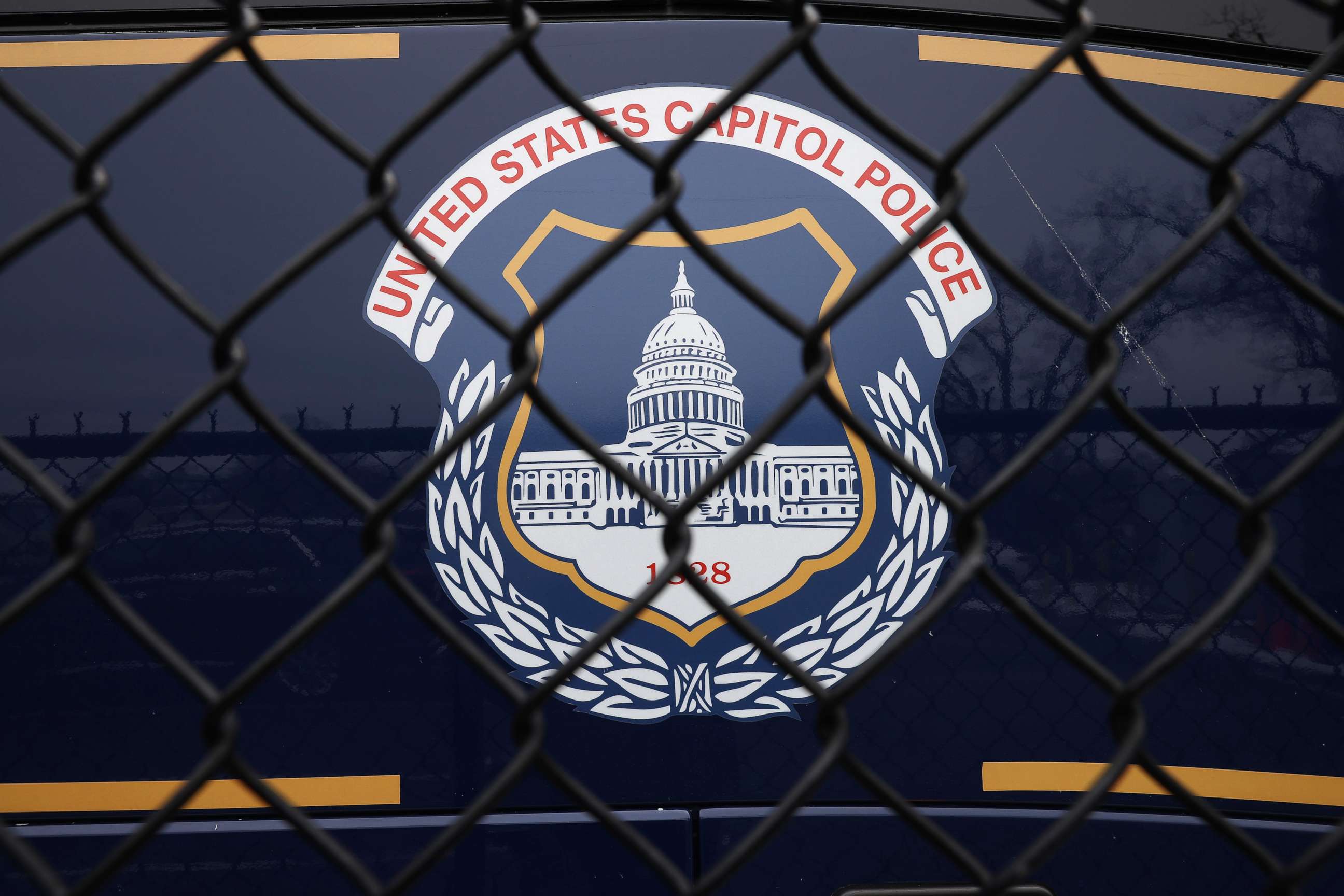 PHOTO: The United States Capitol Police seal appears on the side of a bus parked near the federal law enforcement agency's headquarters in Washington, D.C., on Feb. 19, 2021.