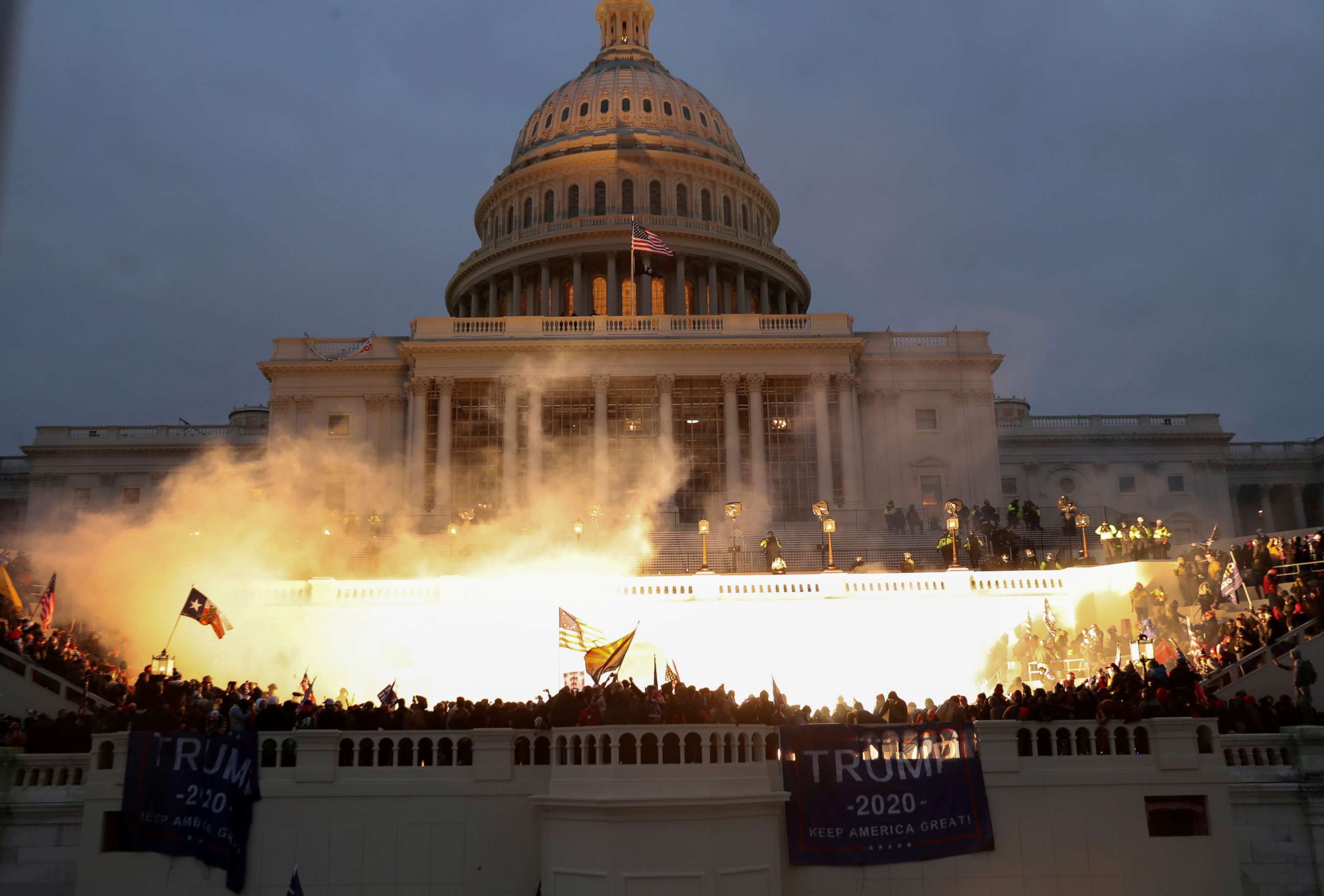 PHOTO: An explosion caused by a police munition is seen while supporters of U.S. President Donald Trump gather in front of the U.S. Capitol building in Washington, D.C., on Jan. 6, 2021.