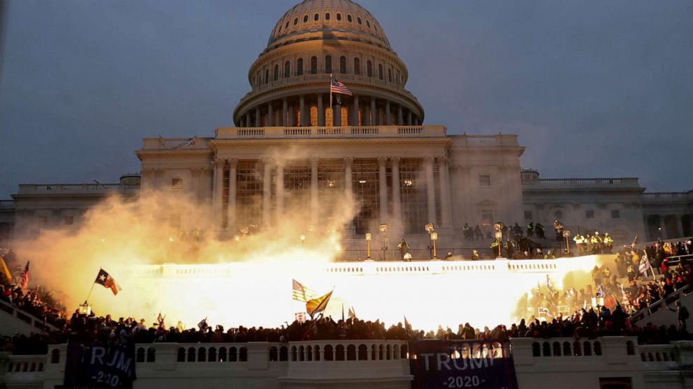 PHOTO: An explosion caused by a police munition is seen while supporters of U.S. President Donald Trump gather in front of the U.S. Capitol Building in Washington, D.C., on Jan. 6, 2021.