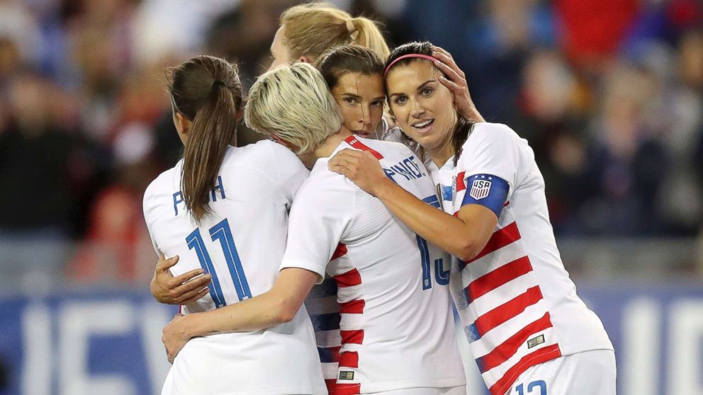 PHOTO: United States' Tobin Heath, second from right, is congratulated on her goal by Mallory Pugh (11), Megan Rapinoe and Alex Morgan (13) during the first half of a SheBelieves Cup soccer match against Brazil, March 5, 2019, in Tampa, Fla.