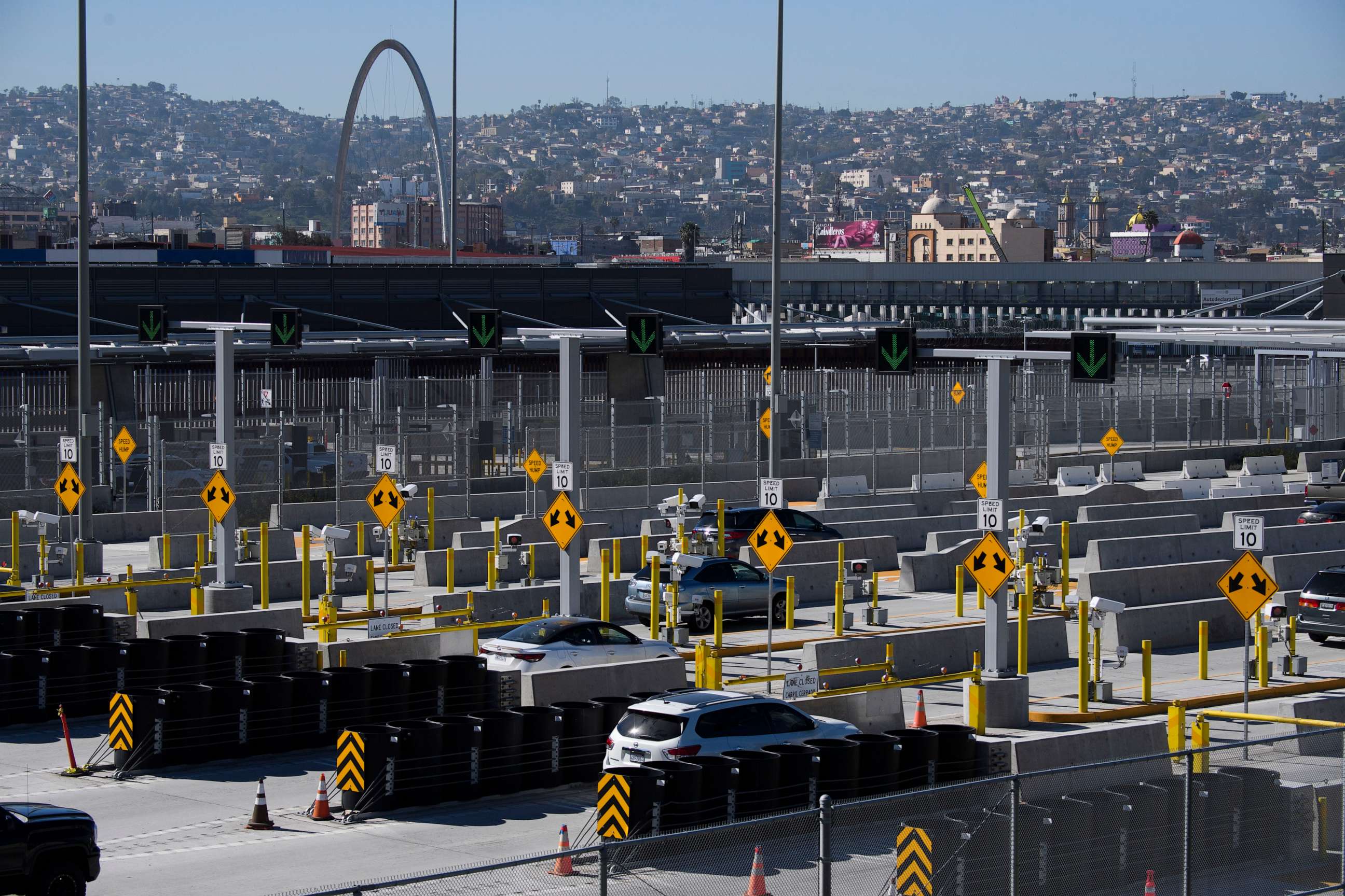 PHOTO: Vehicles enter the San Ysidro Port of Entry border checkpoint at the U.S. - Mexico border, Feb. 19, 2021, in San Diego, Calif.