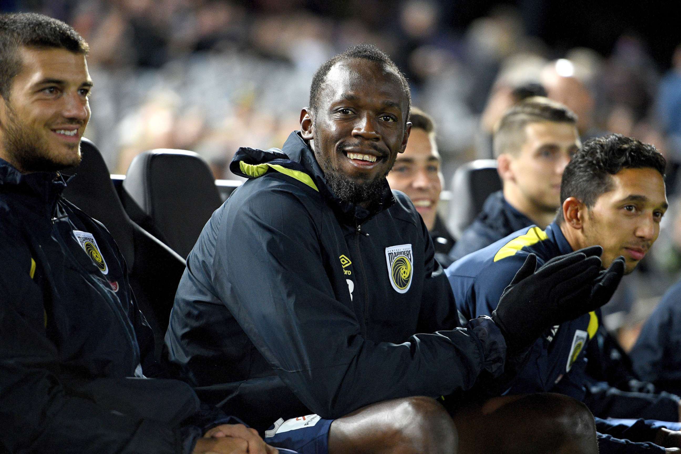 PHOTO: Usain Bolt, of the Mariners, watches on from the bench during a Hyundai A-League trial match between the Central Coast Mariners and the Central Coast Select XI at Central Coast Stadium in Gosford, Australia, Aug. 31, 2018.