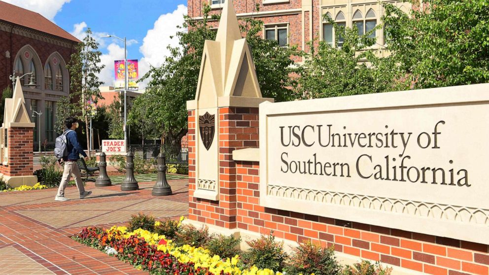 PHOTO: In this file photo taken on March 11, 2020, a student walks on campus at the University of Southern California in Los Angeles.