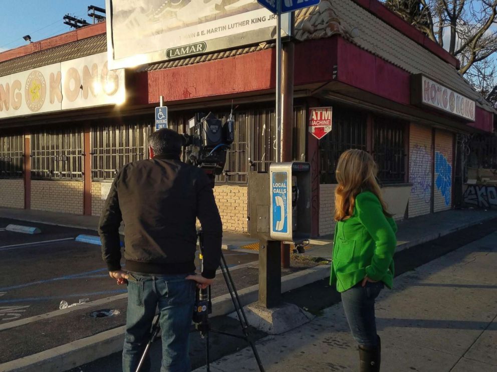 PHOTO: Members of the local media film the scene of a fatal shooting in Los Angeles, March 10, 2019.