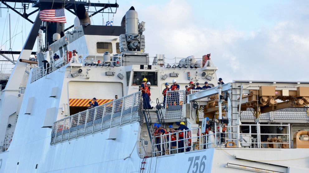 PHOTO: The crew of U.S. Coast Guard cutter Kimball await a passenger transfer just off Honolulu upon arrival Dec. 22, 2018.