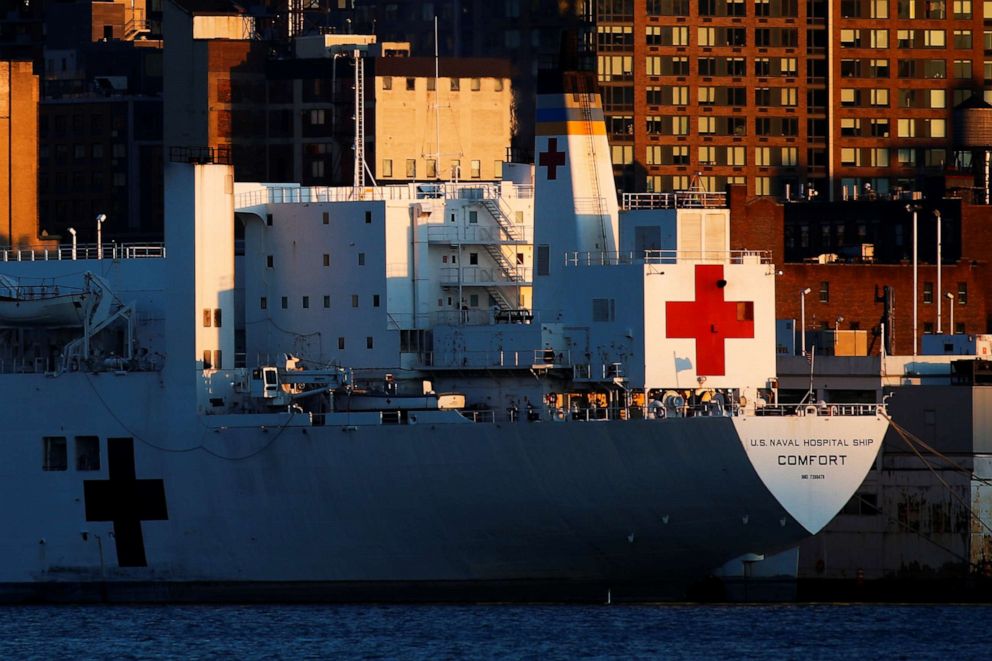 PHOTO: The USNS Comfort naval hospital ship is docked at Pier 90 on New York City's West Side in the Hudson River, during the coronavirus pandemic, as seen from Weehawken, New Jersey, on April 22, 2020.