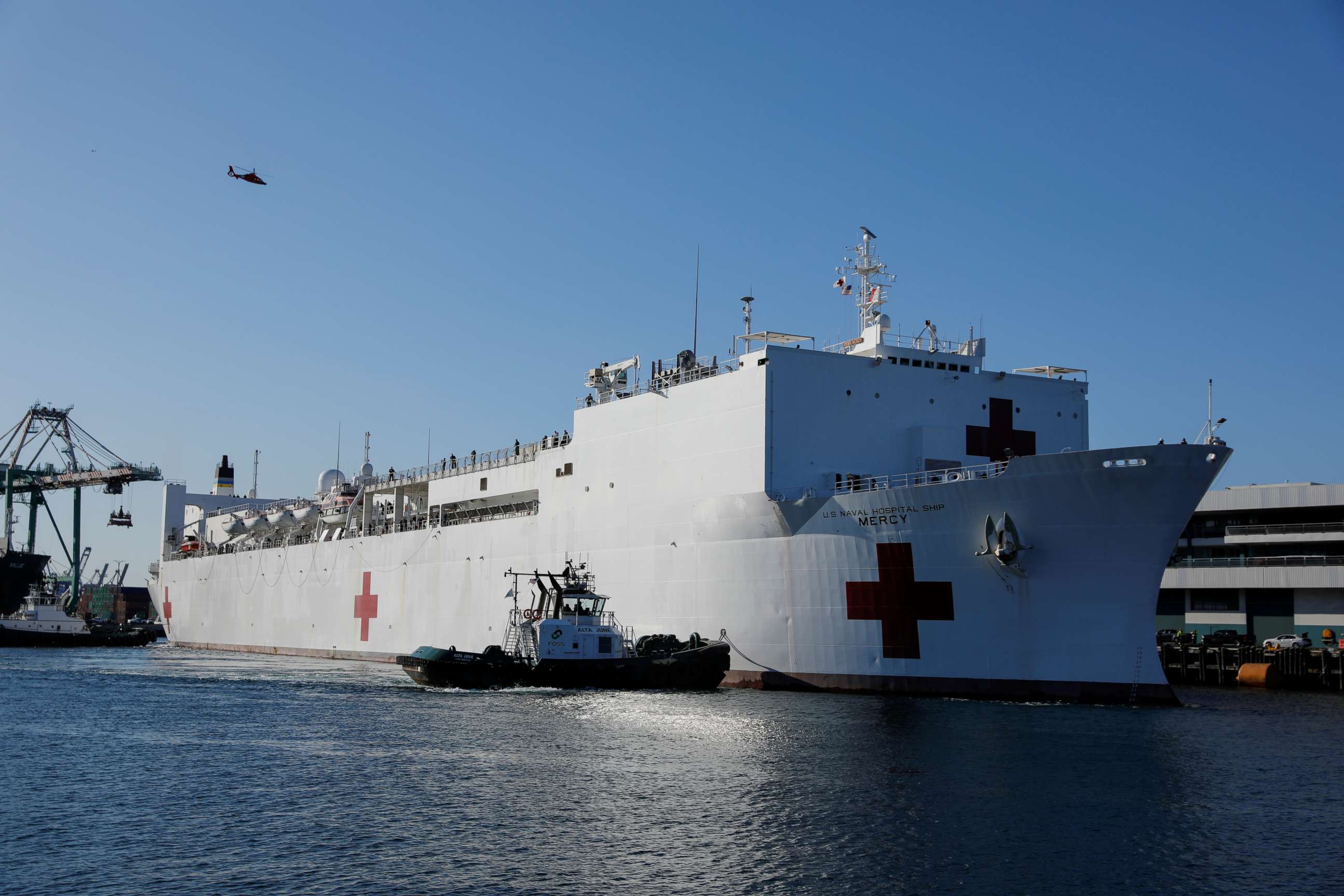 PHOTO: The USNS Mercy hospital ship arrives at the Port of Los Angeles to assist area medical facilities during the outbreak of the novel coronavirus, in Los Angeles, California, on March 27, 2020.