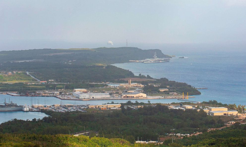 PHOTO: The aircraft carrier USS Theodore Roosevelt (upper right) is docked at Naval Base Guam in Apra Harbor amid the coronavirus pandemic on April 27, 2020.