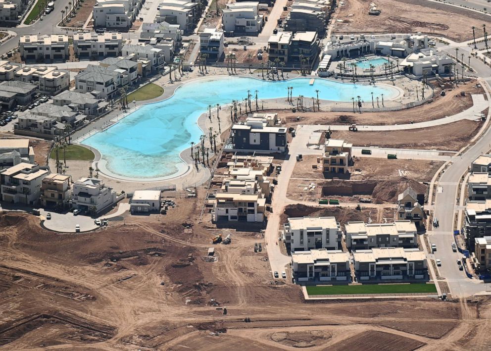 PHOTO: Construction continues at a residential community that surrounds a larger beach-like pool called Desert Color, April 16, 2023, in St. George, Utah.