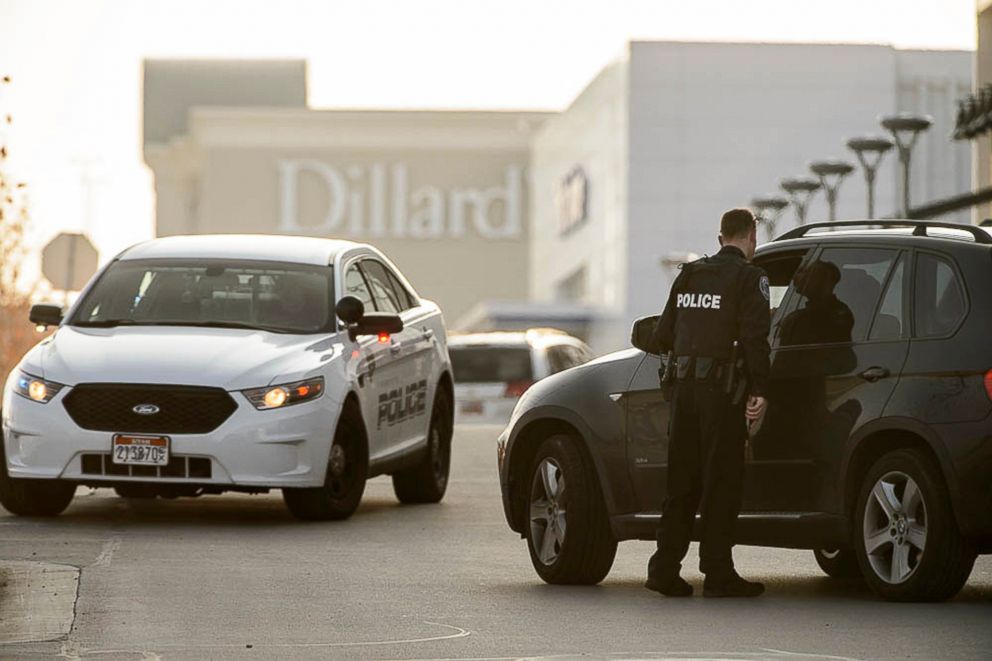 PHOTO: Police escort employees from Dillard's out of the Fashion Place mall after a shooting in Murray, Utah, Jan. 13, 2019.