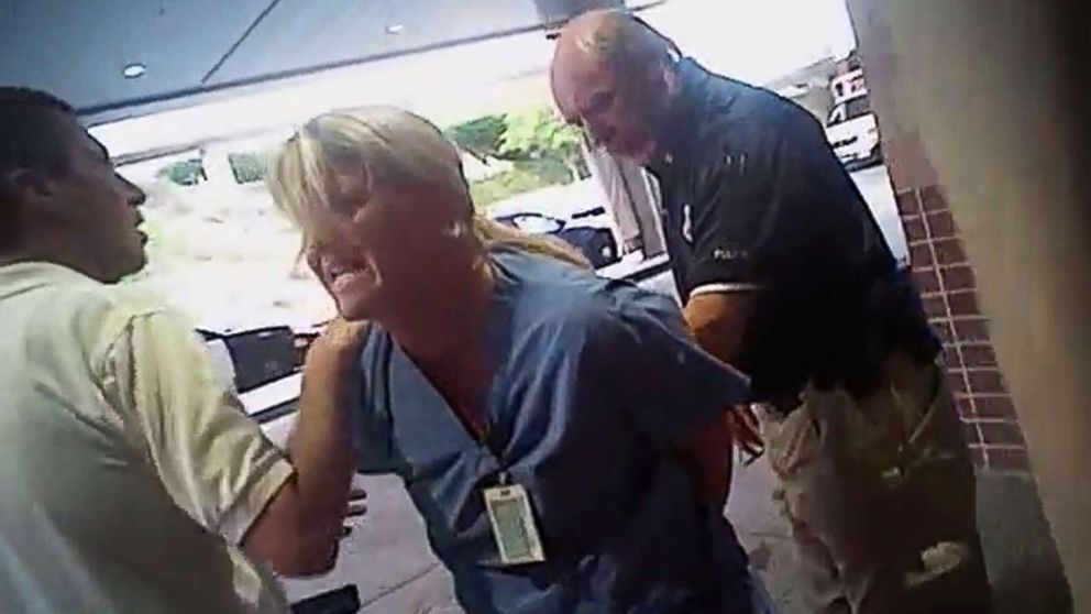 PHOTO: In this July 26, 2017, frame grab from video taken from a police body camera and provided by attorney Karra Porter, nurse Alex Wubbels is arrested by a Salt Lake City police officer at University Hospital in Salt Lake City. 