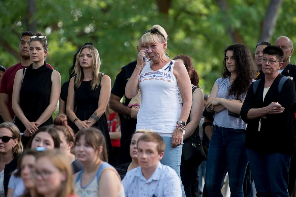 PHOTO: Denis Dial, a longtime friend of the Lueck family, wipes a tear during a vigil for Mackenzie Lueck at the university in Salt Lake City, July 1, 2019.