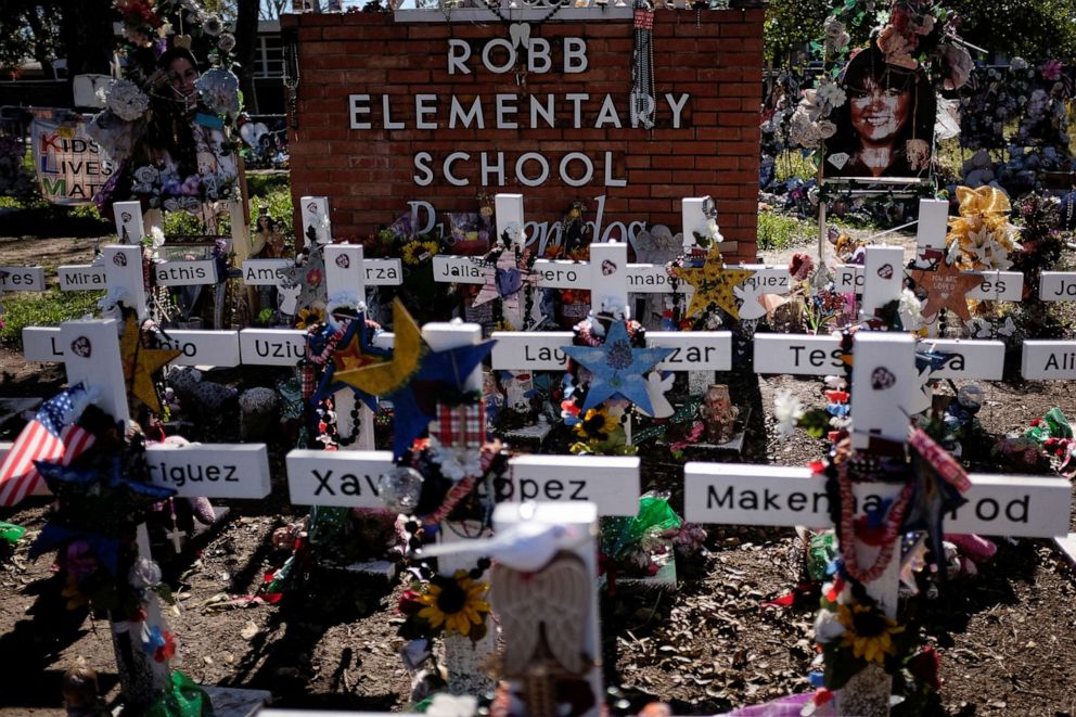 PHOTO: A general view of the memorial in front of Robb Elementary School where a gunman killed 19 children and two teachers in the shooting at a US school in Uvalde, Texas on November 27, 2022. 