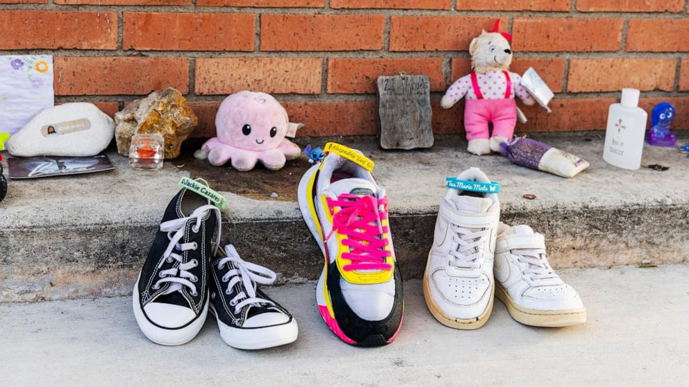 PHOTO: In "77 Minutes in Their Shoes," photographs of the Robb Elementary shooting victims' shoes and portraits of family members will be on display. 