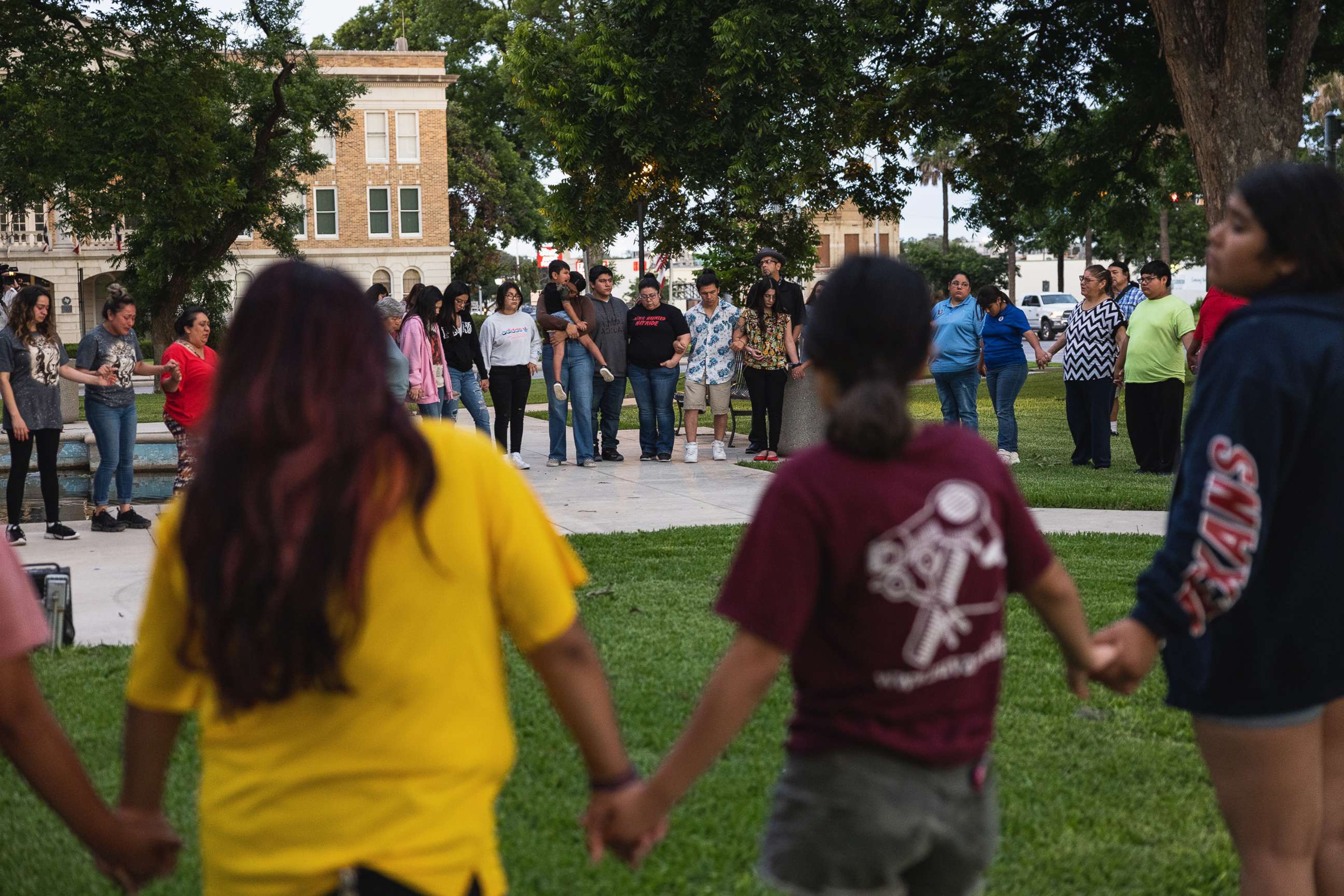 PHOTO: Members of the community gather at the City of Uvalde Town Square for a prayer vigil in the wake of a mass shooting at Robb Elementary School, May 24, 2022, in Uvalde, Texas.