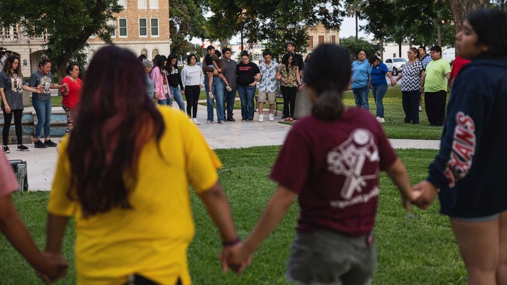 PHOTO: Members of the community gather at the City of Uvalde Town Square for a prayer vigil in the wake of a mass shooting at Robb Elementary School, May 24, 2022, in Uvalde, Texas.