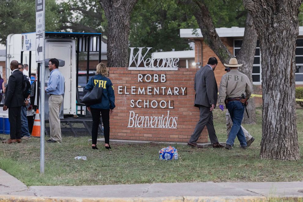 PHOTO: Law enforcement work the scene after a mass shooting at Robb Elementary School , May 24, 2022, in Uvalde, Texas.