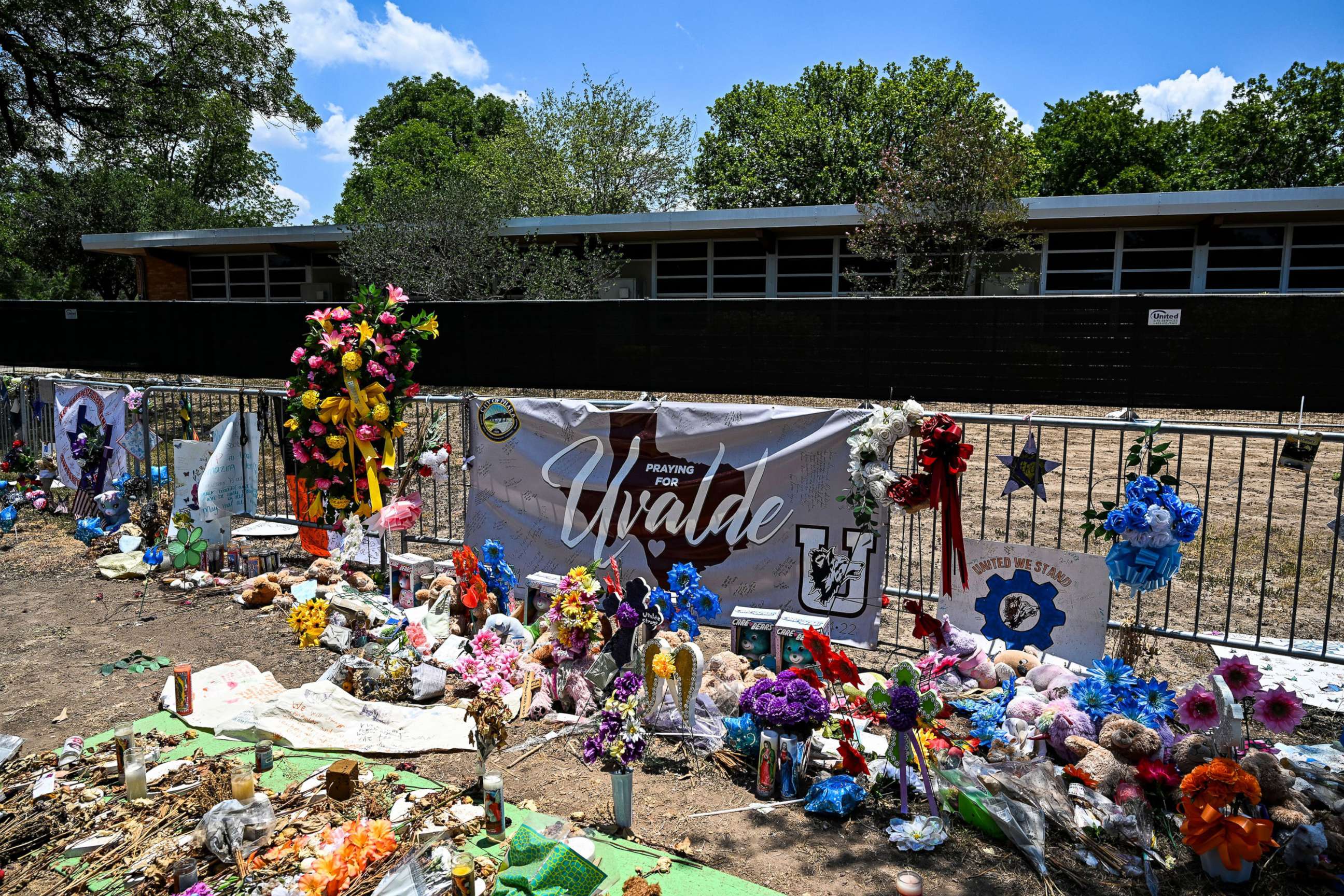 PHOTO: Mementos decorate a makeshift memorial to the victims of a shooting at Robb Elementary School in Uvalde, Texas, June 30, 2022.