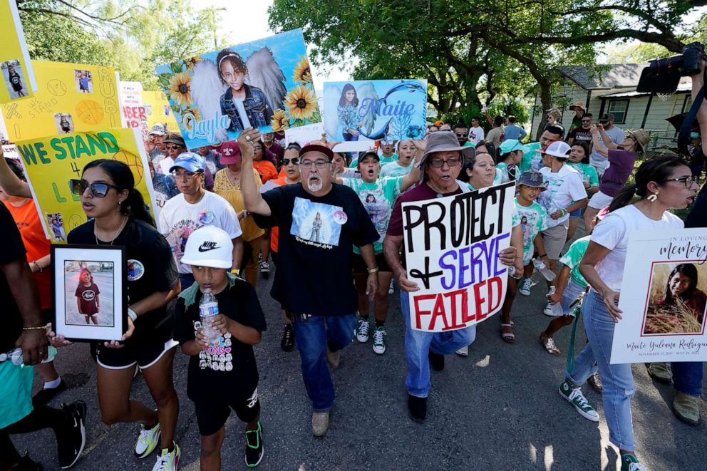 PHOTO: Family and friends of those killed and injured in the school shooting at Robb Elementary take part in a protest march and rally, Sunday, July 10, 2022, in Uvalde, Texas.