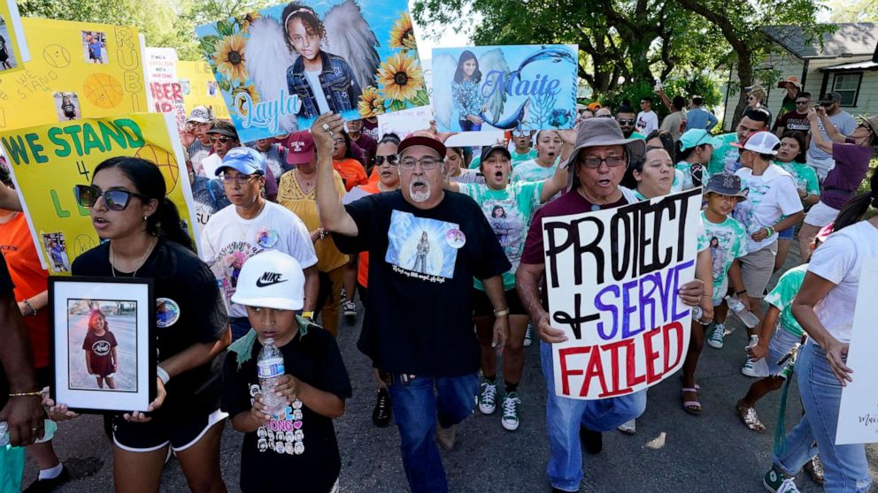 PHOTO: Family and friends of those killed and injured in the school shooting at Robb Elementary take part in a protest march and rally, July 10, 2022, in Uvalde, Texas.