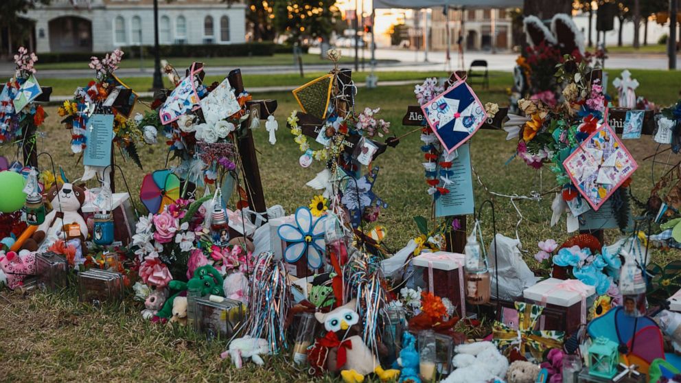 PHOTO: Crosses are decorated with flowers and stuffed animals at a memorial for the victims of the mass shooting at Robb Elementary School, June 25, 2022, in Uvalde, Texas.