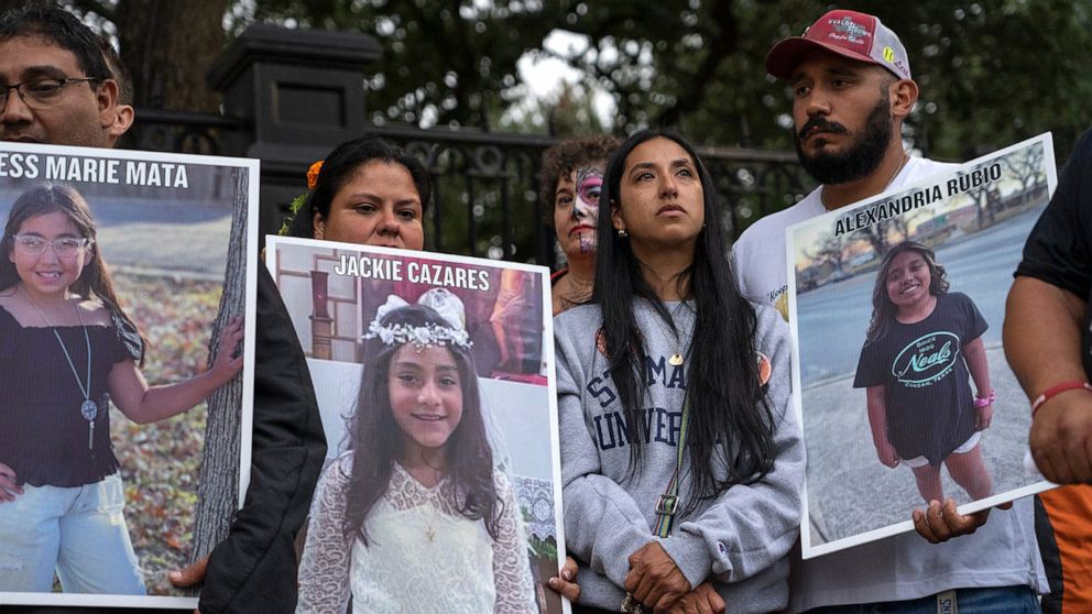 PHOTO: Family of Uvalde shooting victims stand outside the Governor's Mansion during the March of the Children to honor lives lost in Uvalde on Nov. 1, 2022.