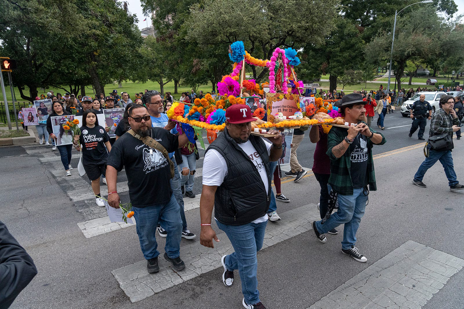 PHOTO: Families of Uvalde shooting victims carry a Dia de Los Muertos ofrenda from the Capitol to the Governor's Mansion during the March of the Children to honor lives lost in Uvalde on Nov. 1, 2022.