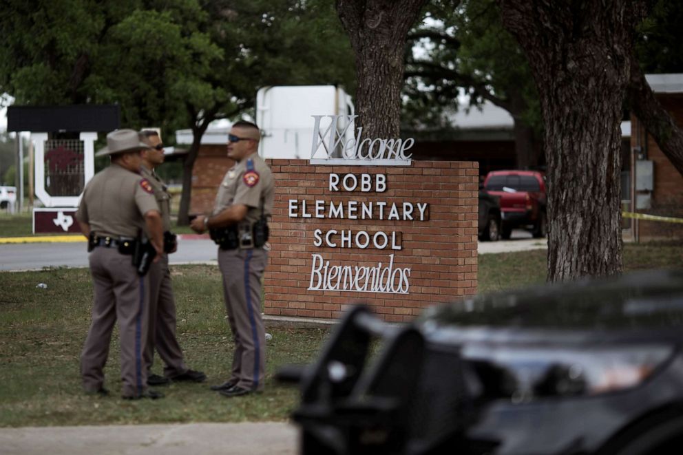 PHOTO: Texas state troopers outside Robb Elementary School in Uvalde, Texas, May 24, 2022.