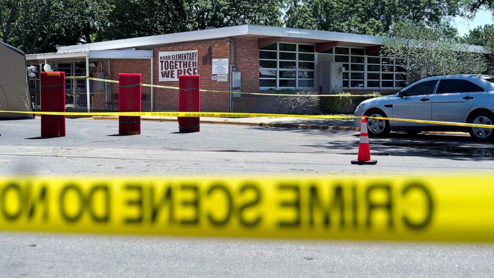 PHOTO: In this May 25, 2022, file photo, crime scene tape surrounds Robb Elementary School after a mass shooting in Uvalde, Texas.