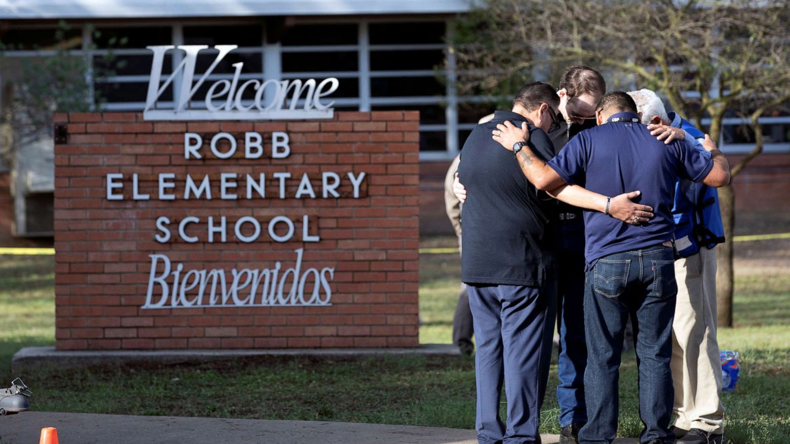 PHOTO: People gather at Robb Elementary School, the scene of a mass shooting in Uvalde, Texas, May 25, 2022.